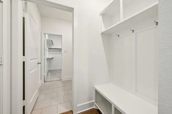 a bathroom with a bathtub and a toilet