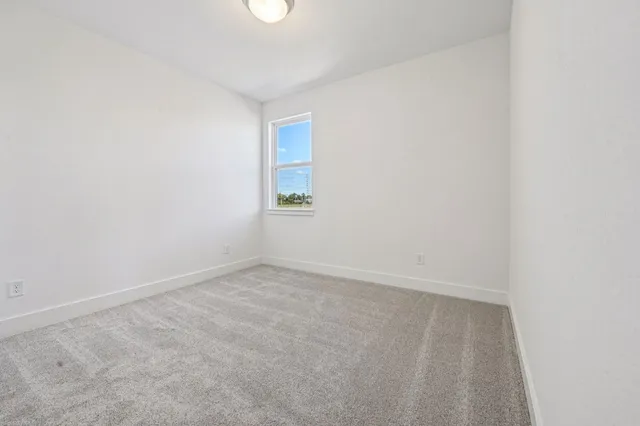 a bathroom with a sink toilet and a mirror
