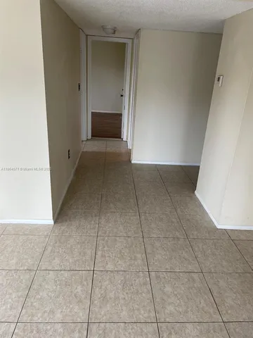 a view of livingroom with hallway