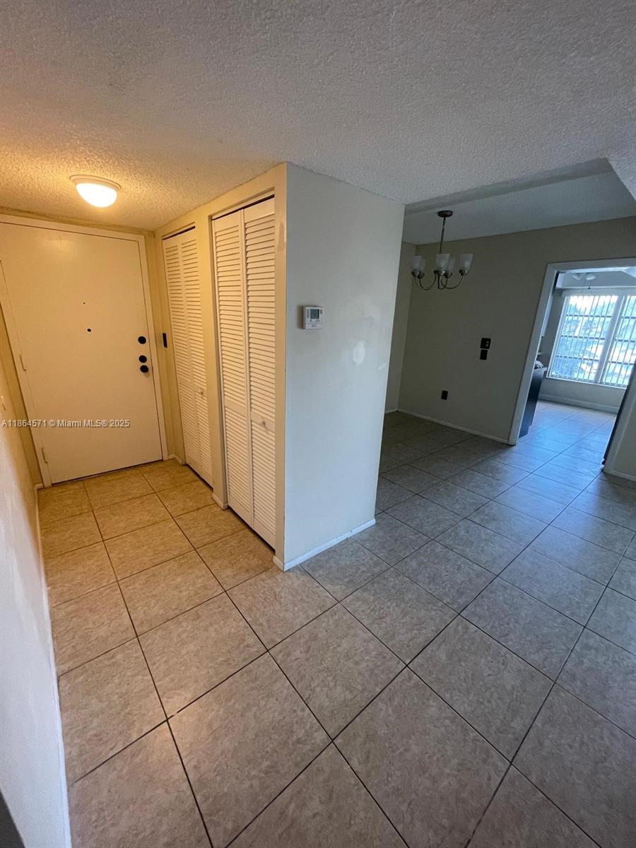 4164 Inverrary Drive, Unit 215 Lauderhill, FL 33319 - Photo 26 of 27 a view of a livingroom with wooden floor