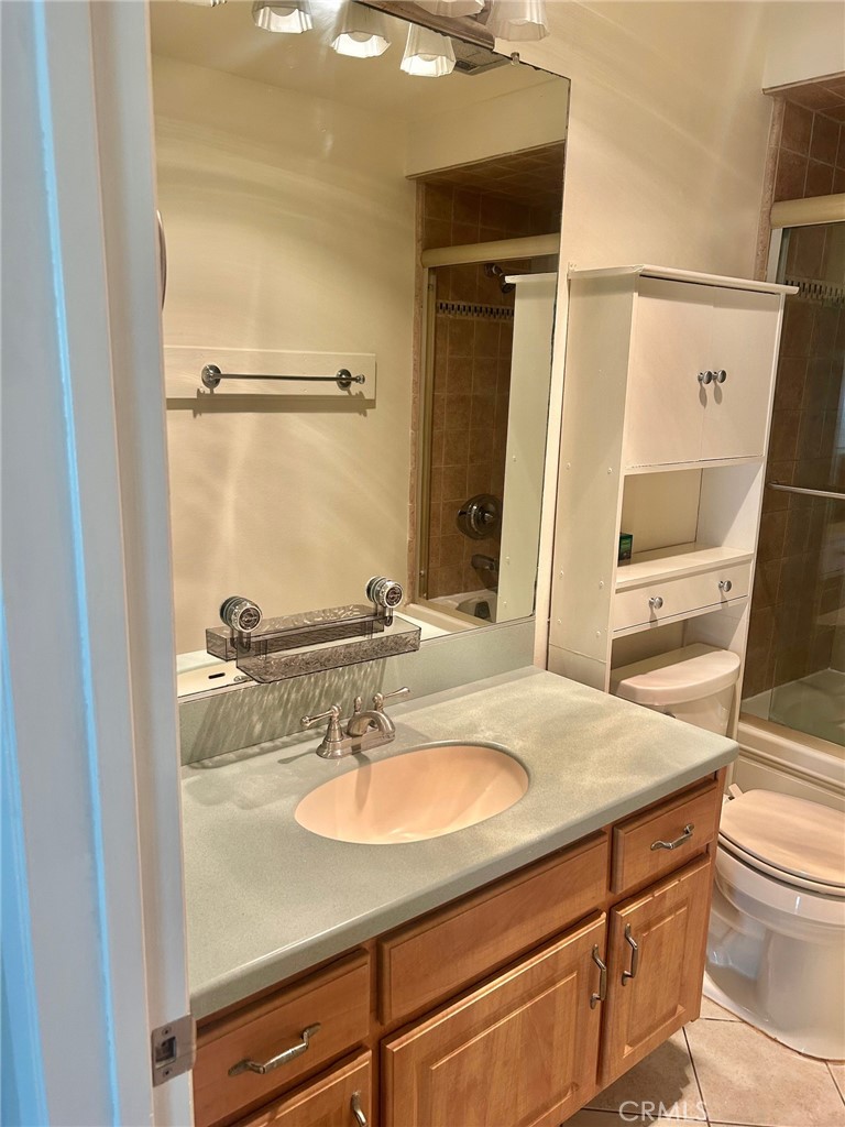 3605 West Hidden Lane, Unit 309 Rolling Hills Estates, CA 90274 - Photo 12 of 37 a bathroom with a sink and a mirror