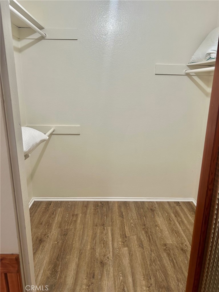 3605 West Hidden Lane, Unit 309 Rolling Hills Estates, CA 90274 - Photo 14 of 37 a view of walk in closet with empty racks