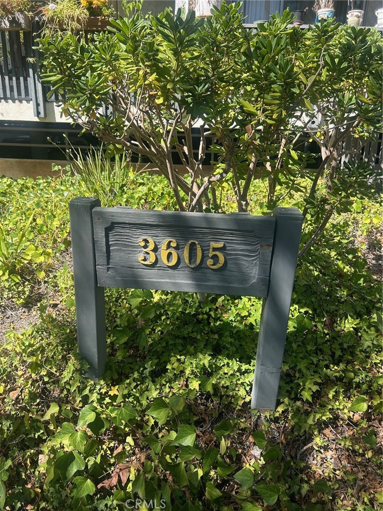 3605 West Hidden Lane, Unit 309 Rolling Hills Estates, CA 90274 - Photo 2 of 37 a sign broad in front of flowers
