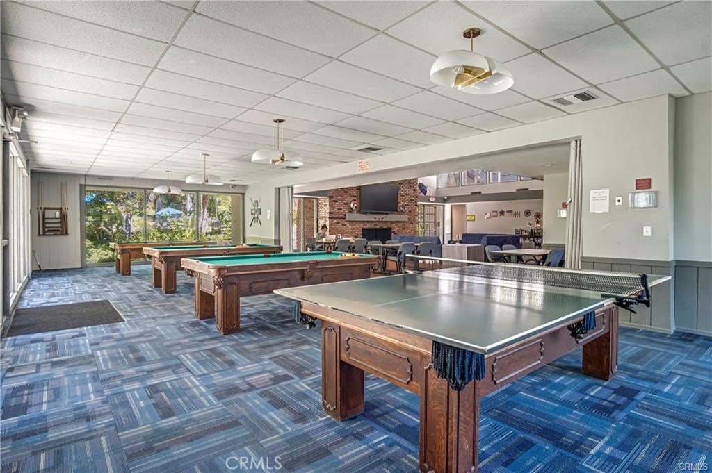 3605 West Hidden Lane, Unit 309 Rolling Hills Estates, CA 90274 - Photo 26 of 37 a room with pool table and windows