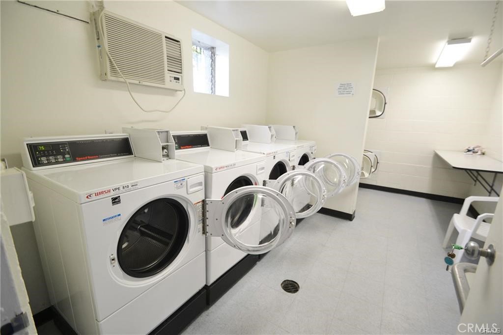 3605 West Hidden Lane, Unit 309 Rolling Hills Estates, CA 90274 - Photo 29 of 37 a utility room with dryer and washer