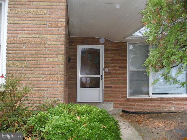 206 East Providence Road Yeadon, PA 19050 - Photo 1 of 25 a brick house with a large windows