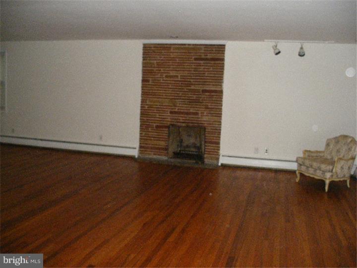 206 East Providence Road Yeadon, PA 19050 - Photo 4 of 25 wooden floor in an empty room