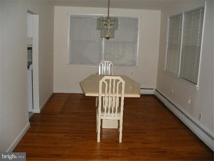 206 East Providence Road Yeadon, PA 19050 - Photo 7 of 25 a view of a hallway with wooden floor and staircase