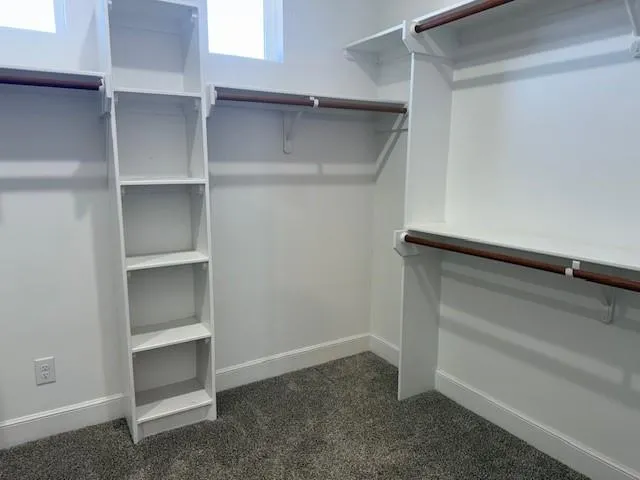 a view of an empty walk in closet