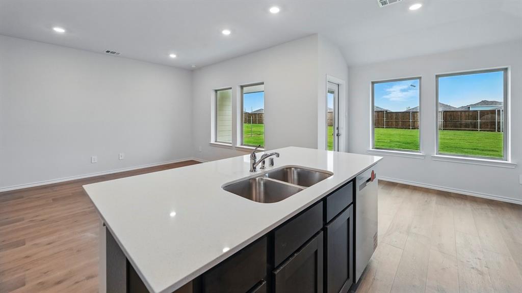 511 Lantana Road Princeton, TX 75407 - Photo 23 of 35 a kitchen with sink and large window