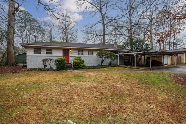 front view of a house with a yard