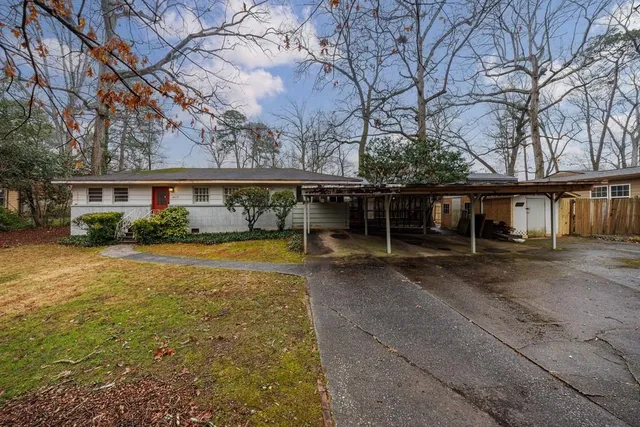 a view of a house with a swimming pool