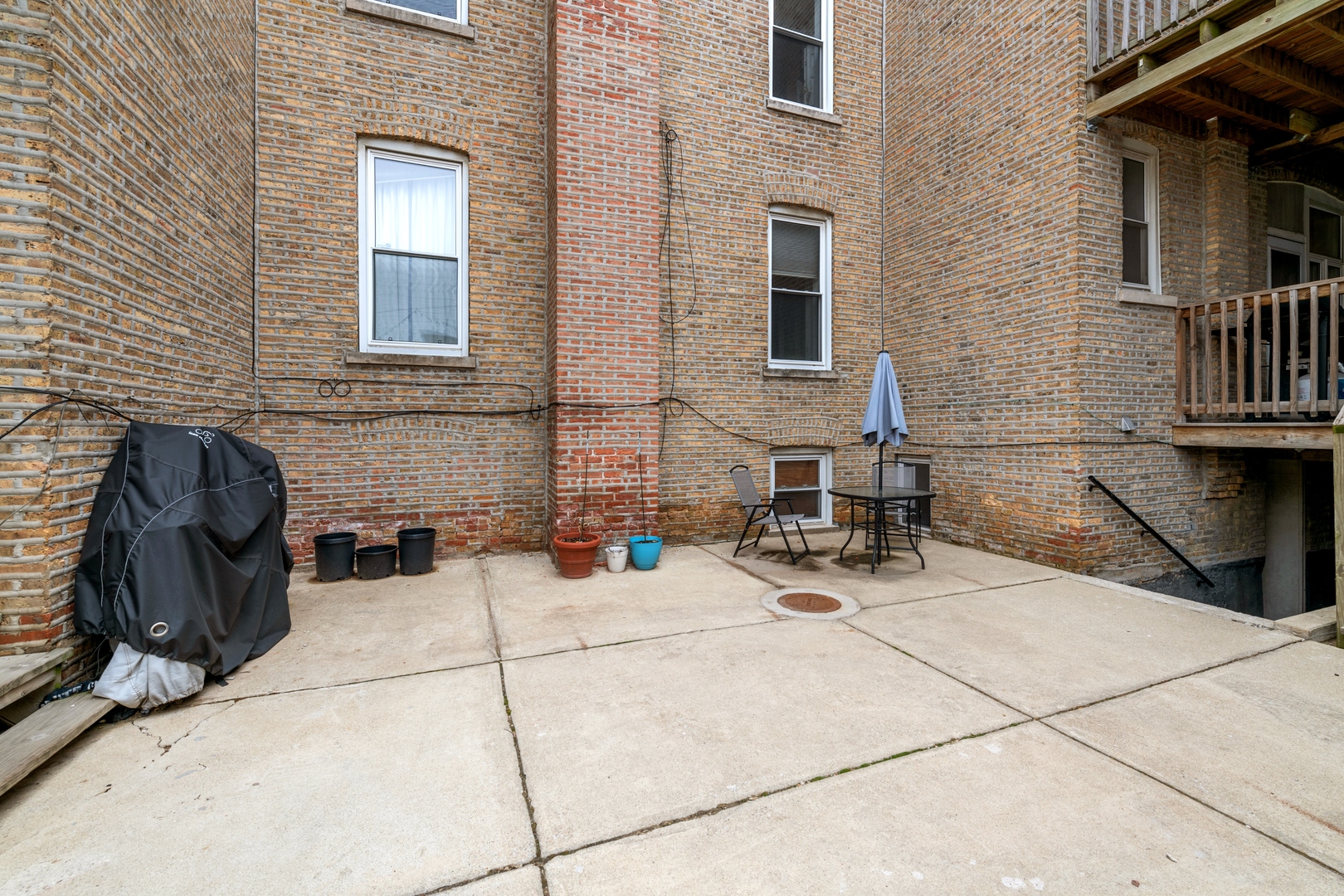 3845 West Altgeld Street, Unit G Chicago, IL 60647 - Photo 14 of 15 a bathroom with a sink and a mirror