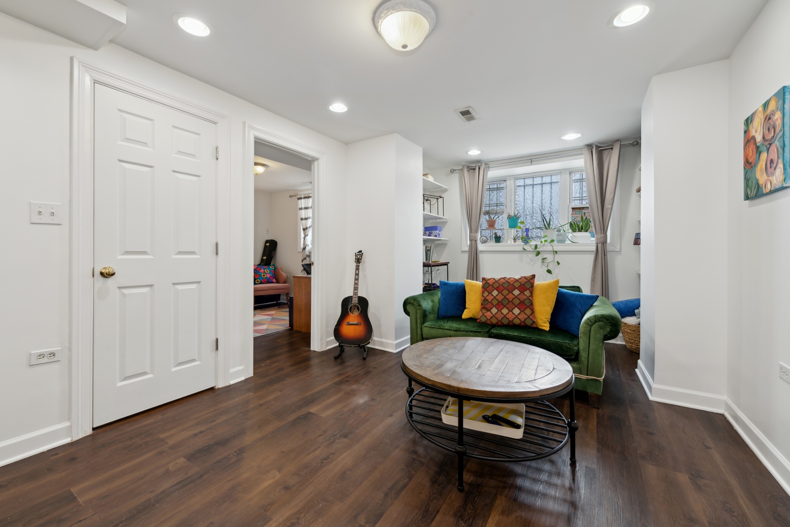 3845 West Altgeld Street, Unit G Chicago, IL 60647 - Photo 3 of 15 a living room with furniture and a wooden floor
