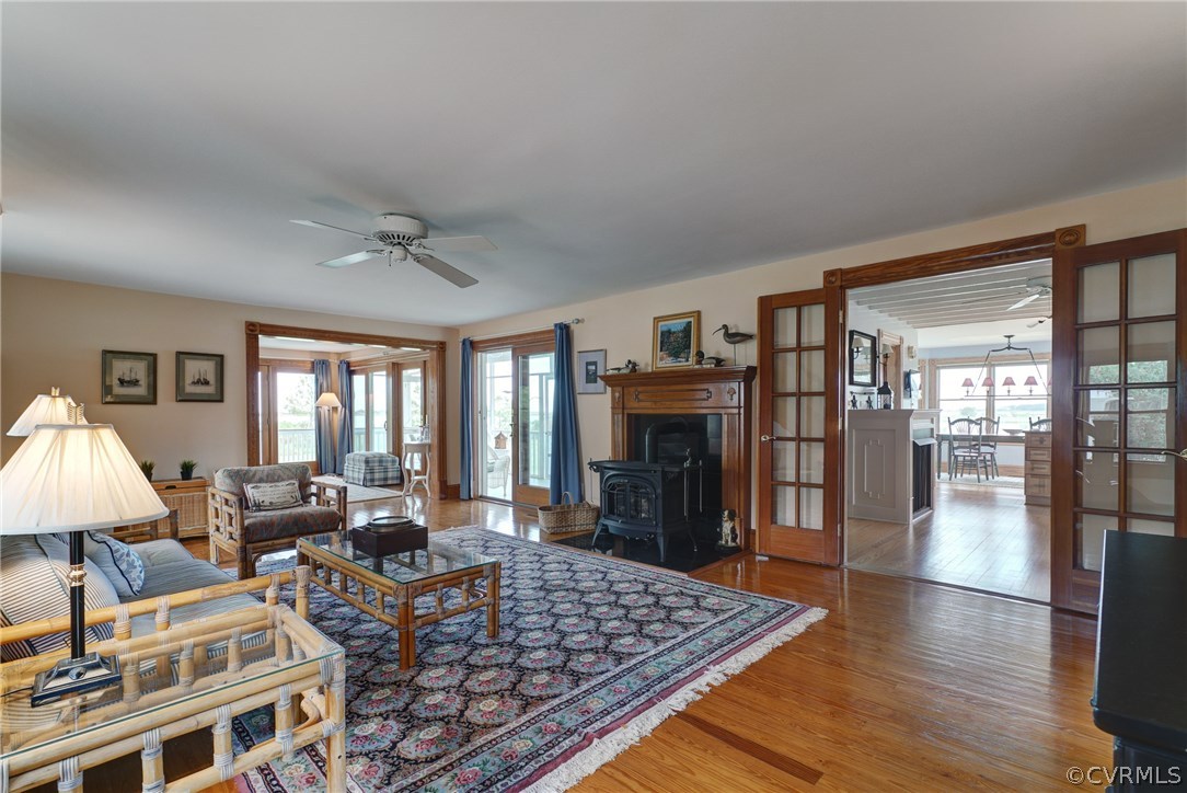192 Captain Genes Rd Port Mathews, VA 23109 - Photo 11 of 49 a living room with fireplace furniture and a window