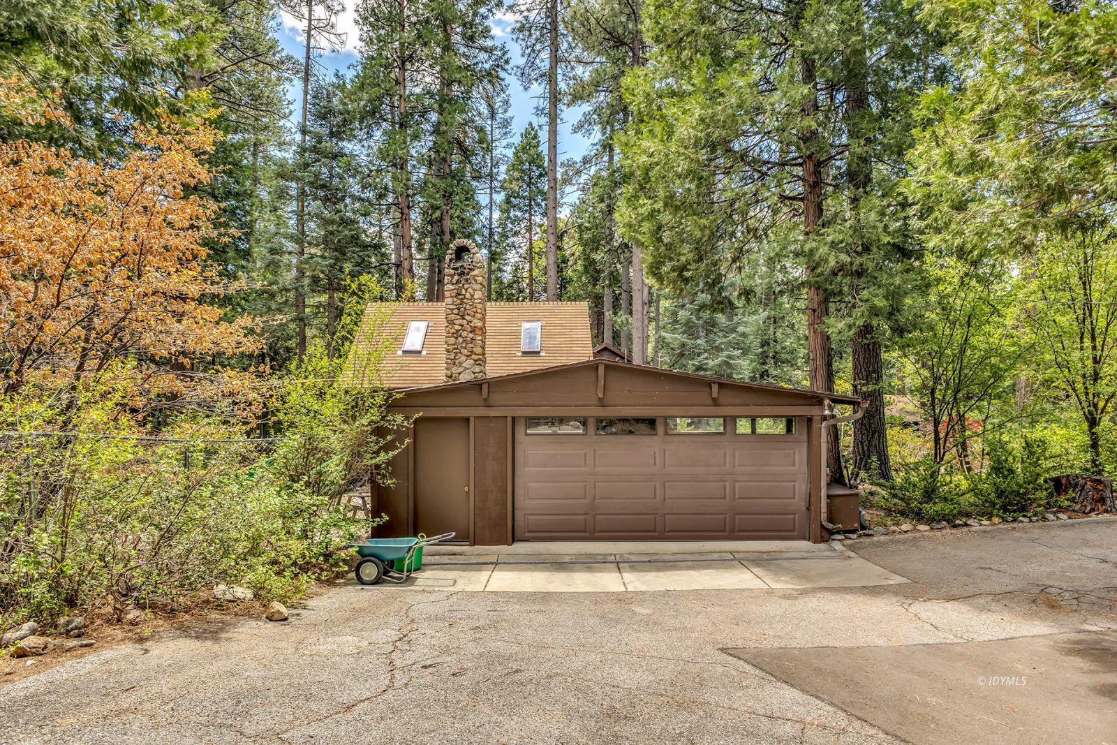 25100 Indian Rock Road Idyllwild, CA 92549 - Photo 58 of 75 a front view of a building with a trees
