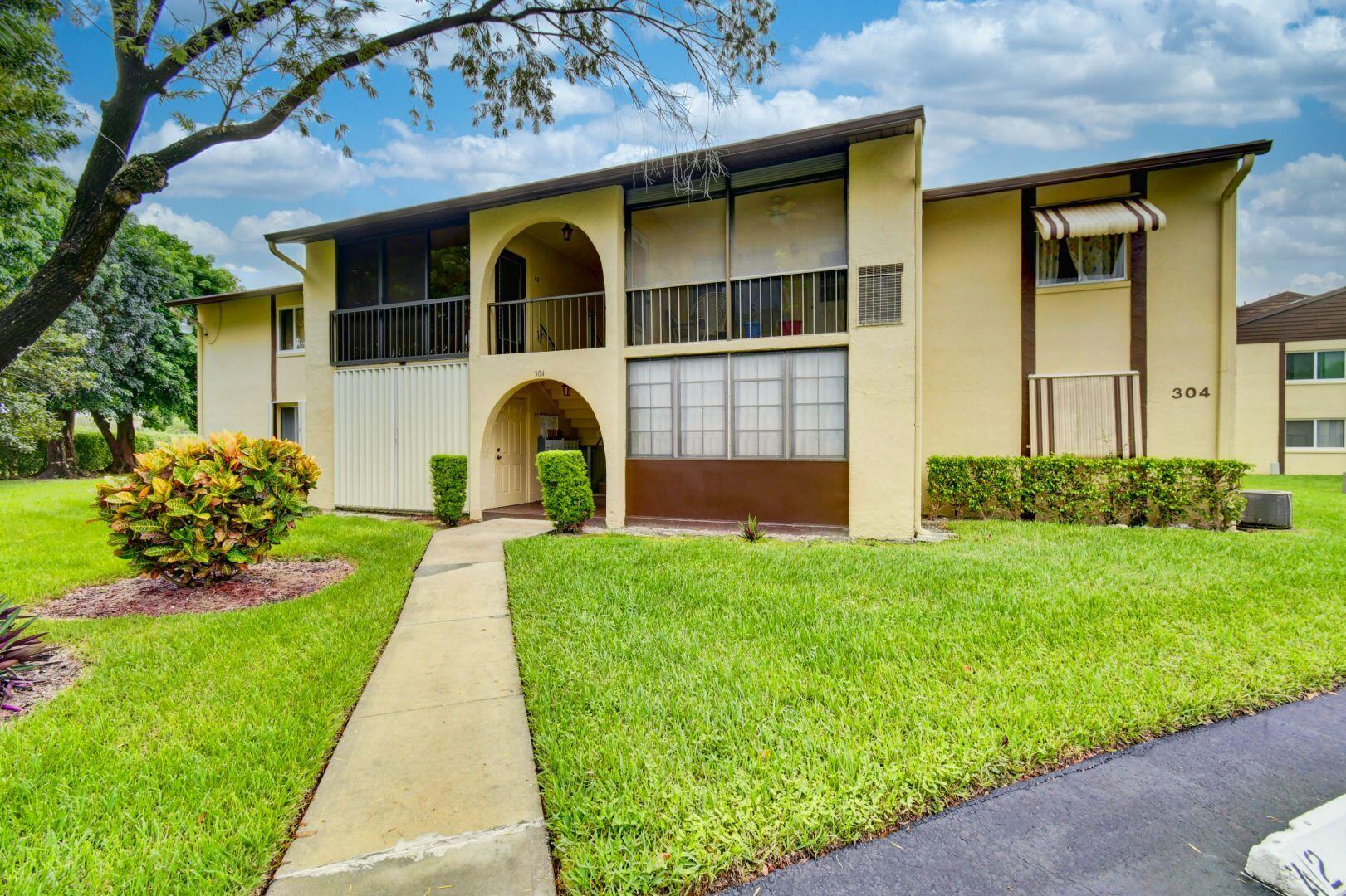 304 Pine Ridge Circle, Unit C2 Greenacres, FL 33463 - Photo 2 of 34 01_dsc_1203_4_5_6_7
