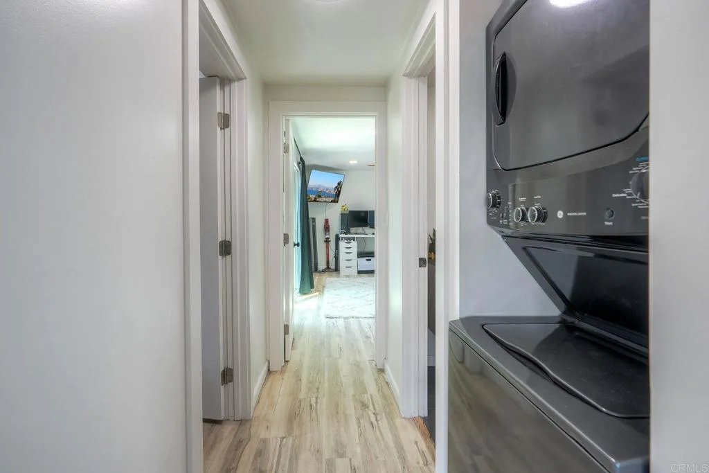 699 North Vulcan Avenue, Unit 6 Encinitas, CA 92024 - Photo 19 of 27 a view of hallway with wooden floor