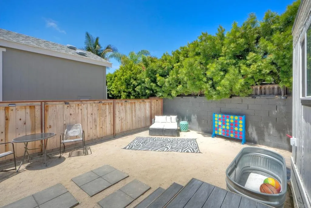699 North Vulcan Avenue, Unit 6 Encinitas, CA 92024 - Photo 20 of 27 a house view with a sitting space