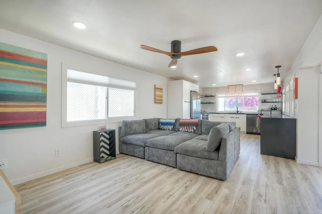 699 North Vulcan Avenue, Unit 6 Encinitas, CA 92024 - Photo 6 of 27 a living room with furniture and a window