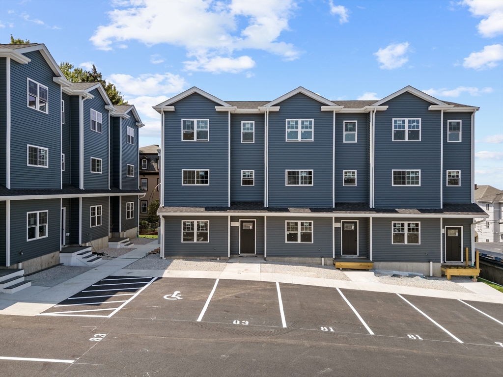 a view of a building with a street
