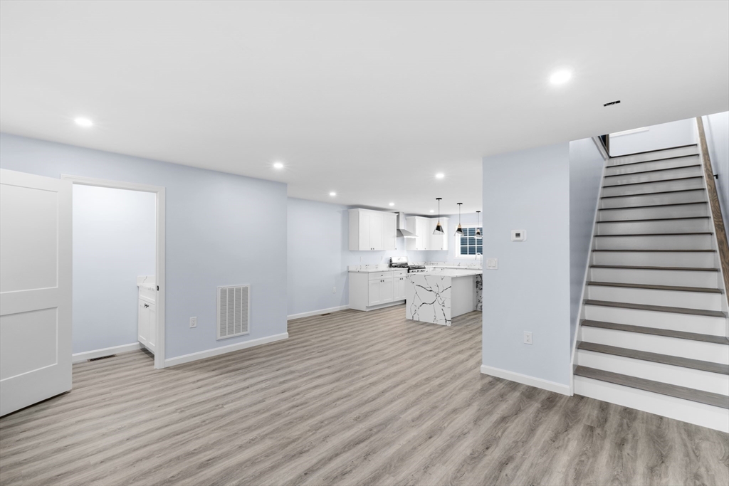 75 Hunter Street Fall River, MA 02721 - Photo 5 of 14 a view of a kitchen with wooden floor