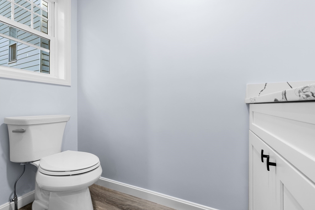 75 Hunter Street Fall River, MA 02721 - Photo 9 of 14 a bathroom with a toilet and a sink