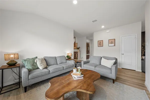 a living room with furniture and a couch