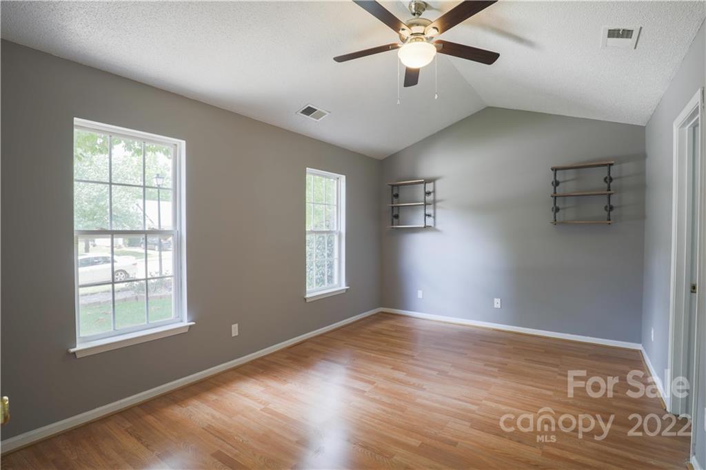 1259 Spring View Court Rock Hill, SC 29732 - Photo 8 of 13 a view of an empty room with a window and wooden floor