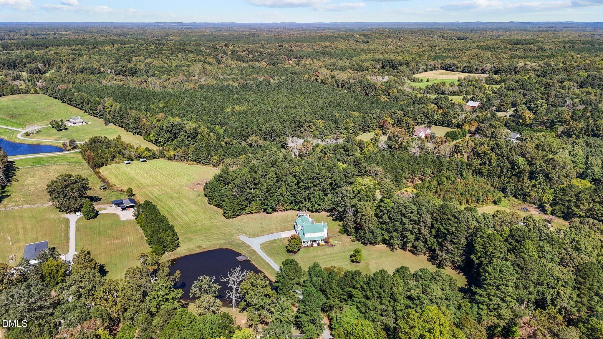 220 Epps Clark Road Siler City, NC 27344 - Photo 12 of 55 an aerial view of a house with a yard