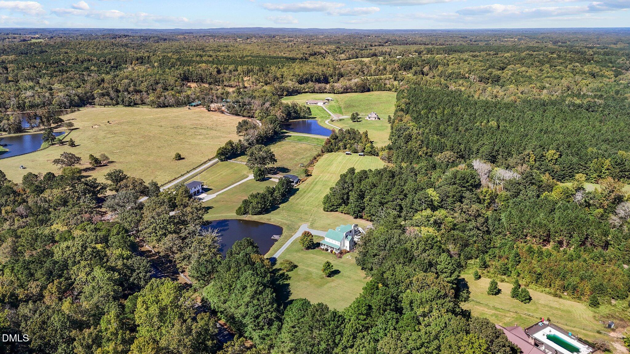 220 Epps Clark Road Siler City, NC 27344 - Photo 19 of 55 an aerial view of a house with a yard