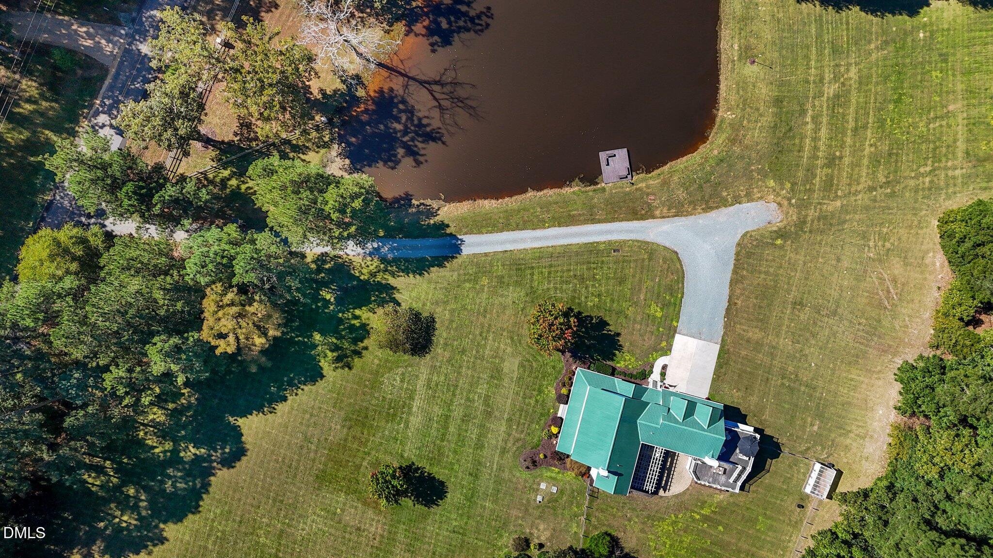 220 Epps Clark Road Siler City, NC 27344 - Photo 20 of 55 an aerial view of a house with a yard