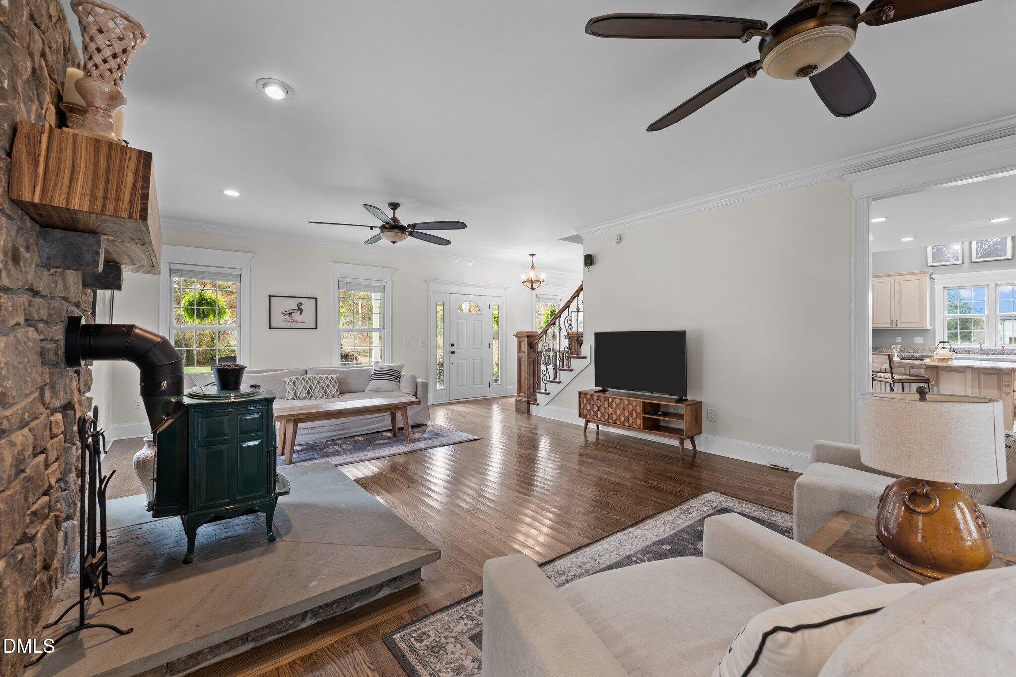 220 Epps Clark Road Siler City, NC 27344 - Photo 36 of 55 a living room with furniture and a flat screen tv