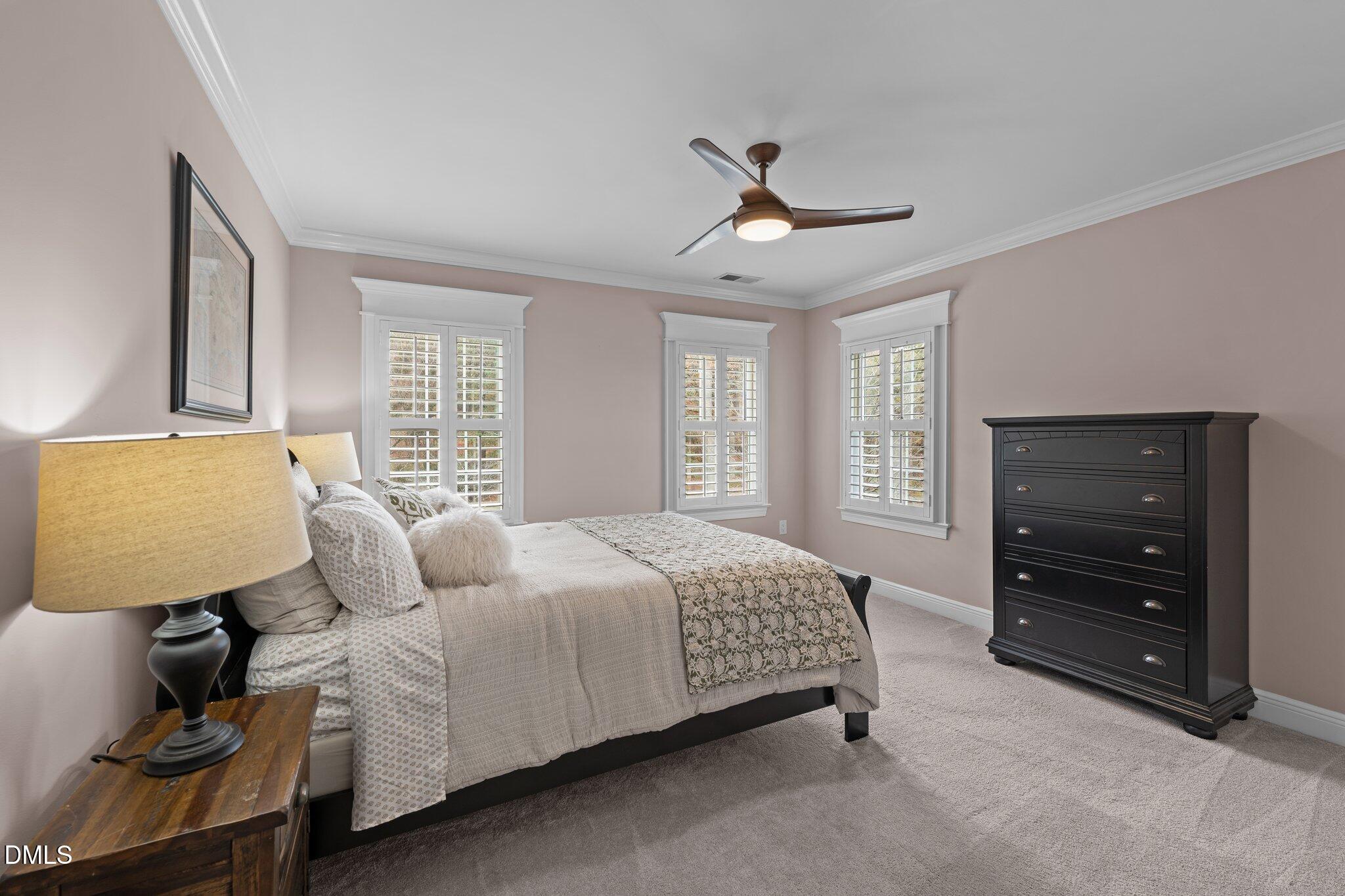 220 Epps Clark Road Siler City, NC 27344 - Photo 43 of 55 a bedroom with a bed and dresser