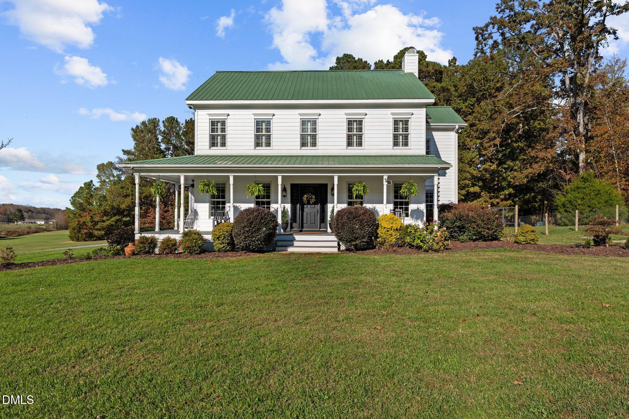 220 Epps Clark Road Siler City, NC 27344 - Photo 55 of 55 a front view of a house with a garden