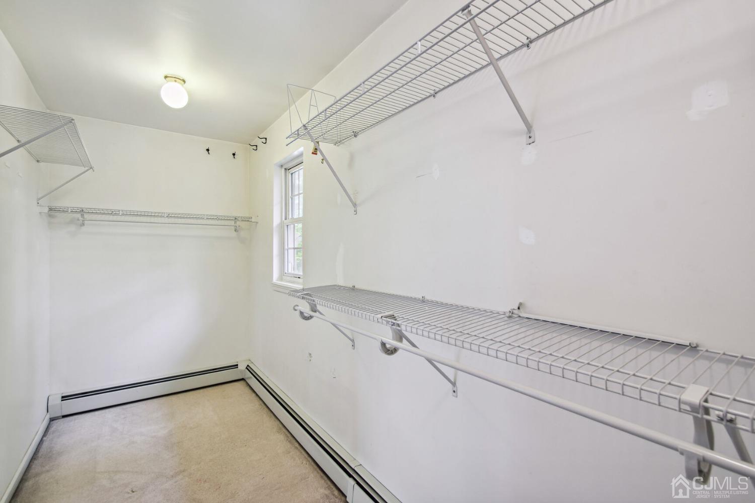 220 Dunhams Corner Road East Brunswick, NJ 08816 - Photo 17 of 27 a view of a room with racks on the wall