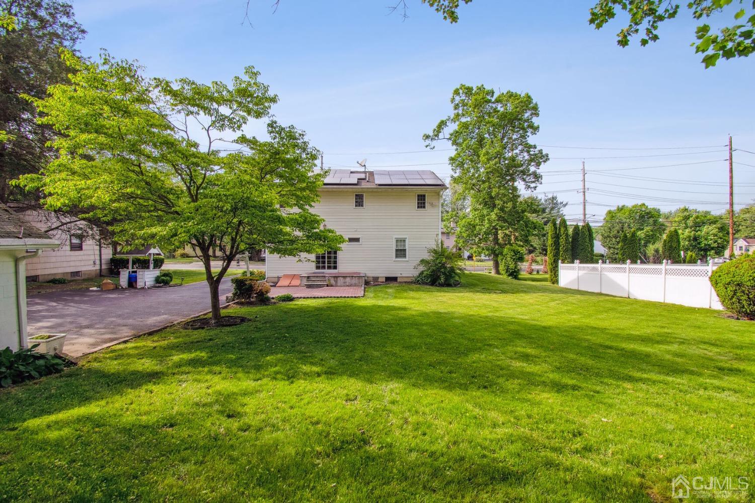 220 Dunhams Corner Road East Brunswick, NJ 08816 - Photo 20 of 27 a view of a backyard with a garden