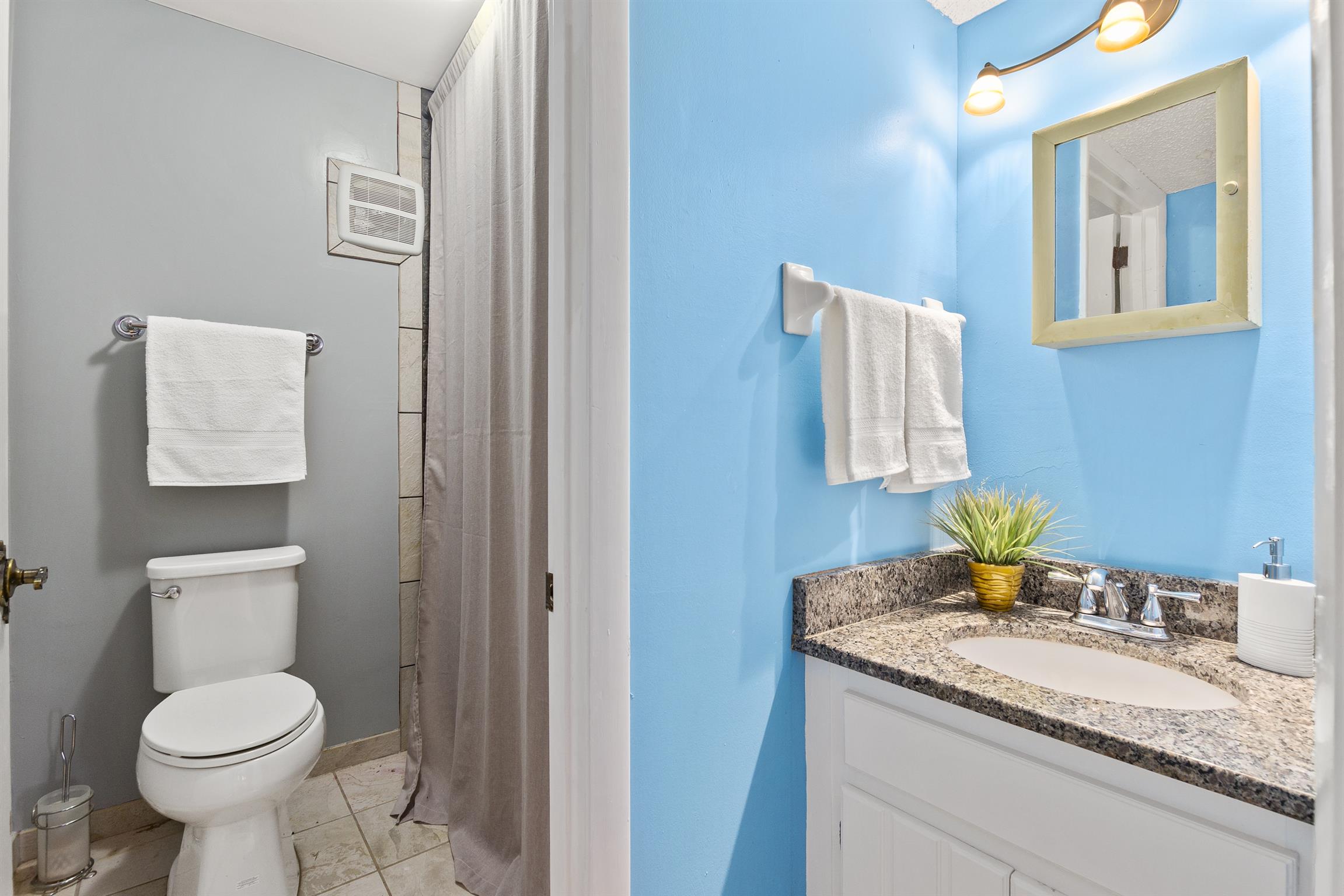 21 Vaughns Gap Road, Unit 23 Nashville, TN 37205 - Photo 11 of 16 a bathroom with a granite countertop sink and a toilet