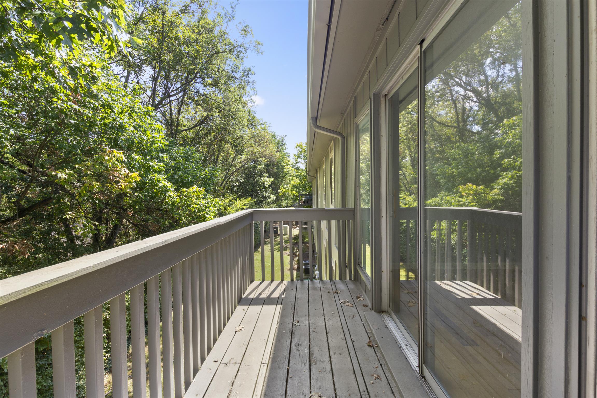 21 Vaughns Gap Road, Unit 23 Nashville, TN 37205 - Photo 14 of 16 a view of balcony with wooden floor