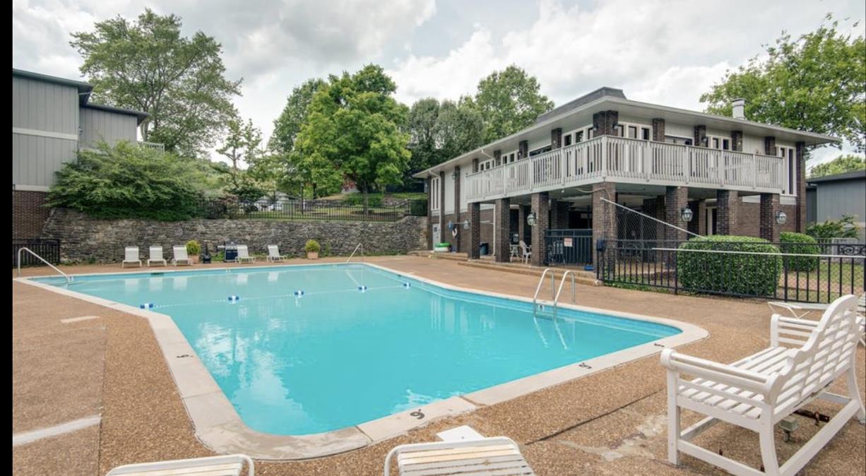 21 Vaughns Gap Road, Unit 23 Nashville, TN 37205 - Photo 16 of 16 a view of a house with a swimming pool