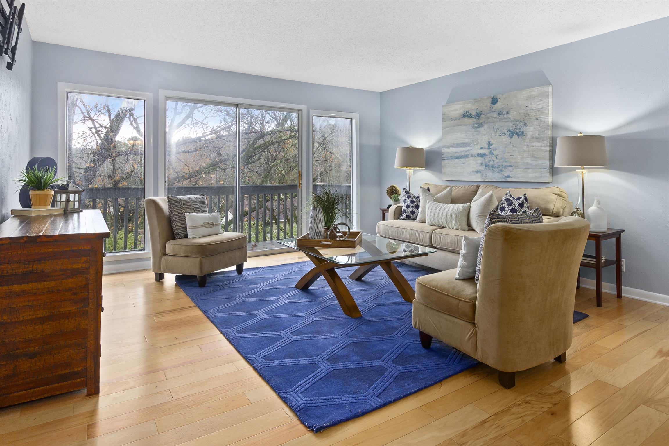 21 Vaughns Gap Road, Unit 23 Nashville, TN 37205 - Photo 3 of 16 a living room with furniture and a large window
