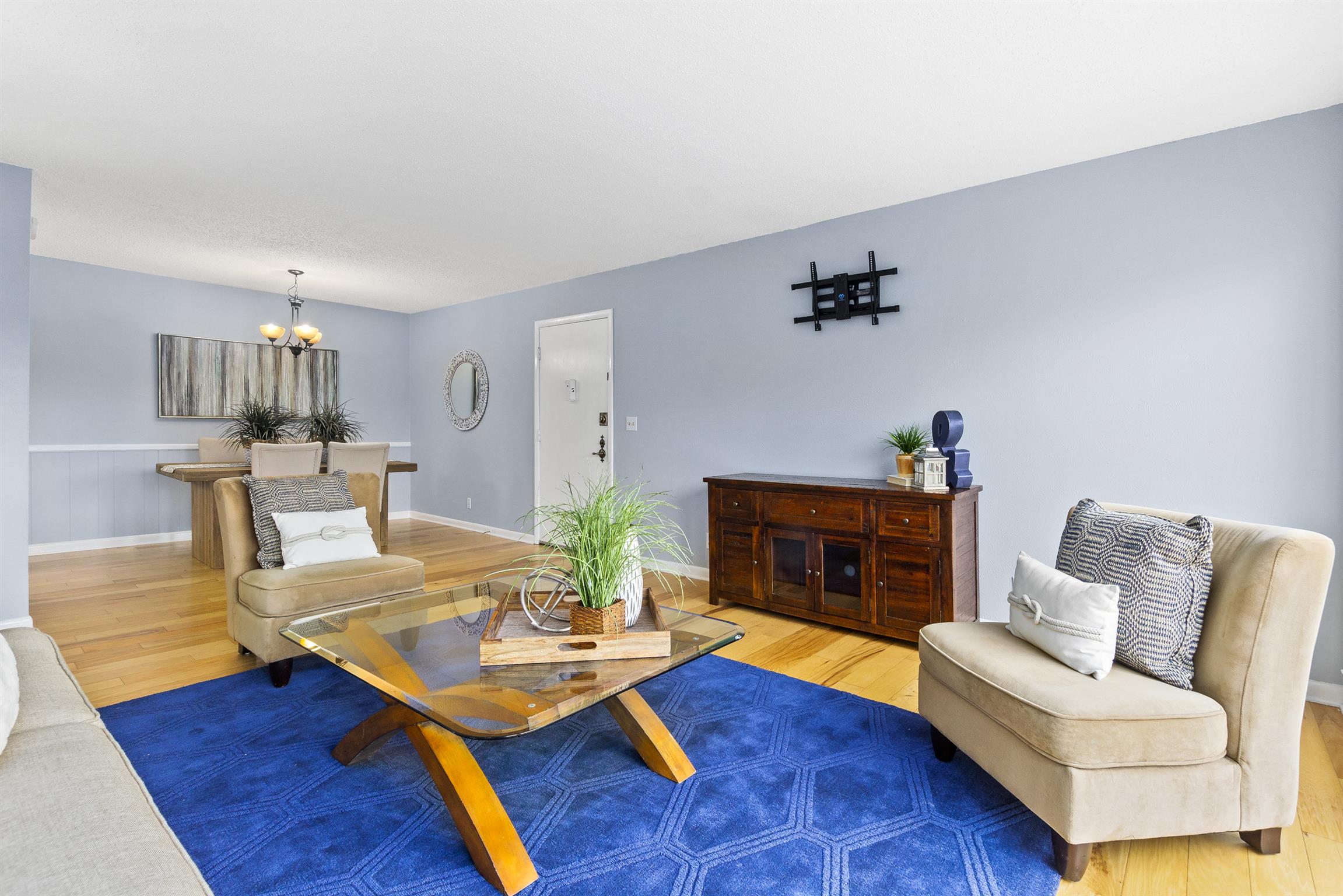 21 Vaughns Gap Road, Unit 23 Nashville, TN 37205 - Photo 4 of 16 a living room with furniture and a fireplace