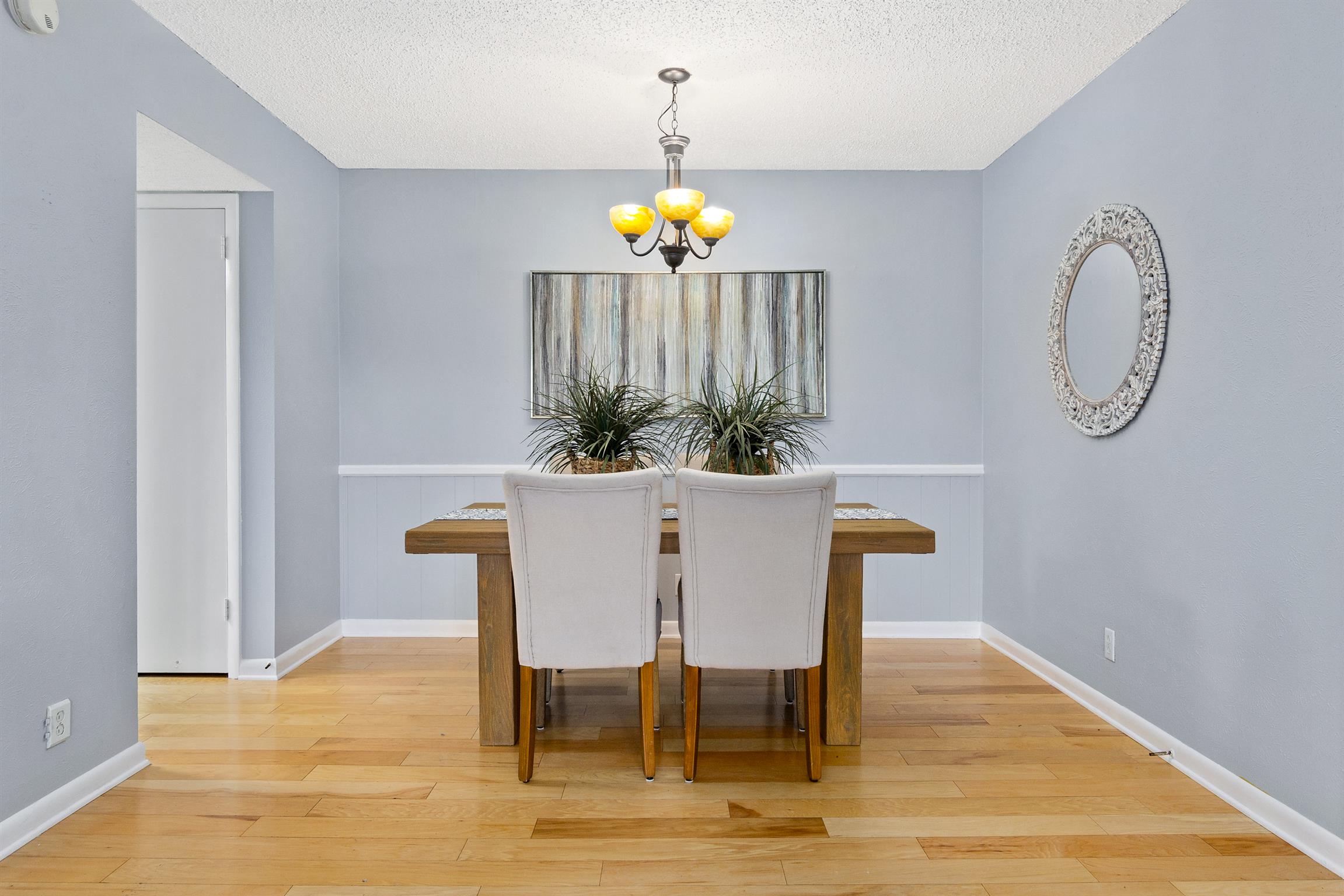 21 Vaughns Gap Road, Unit 23 Nashville, TN 37205 - Photo 6 of 16 a view of a dining room with furniture and wooden floor