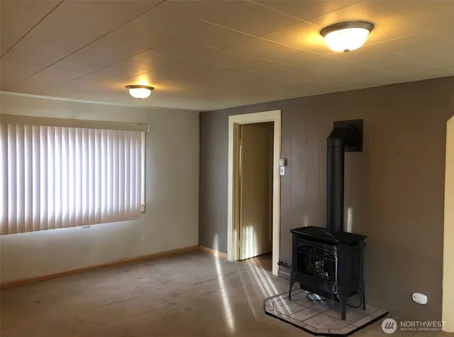 a view of a livingroom with a fireplace