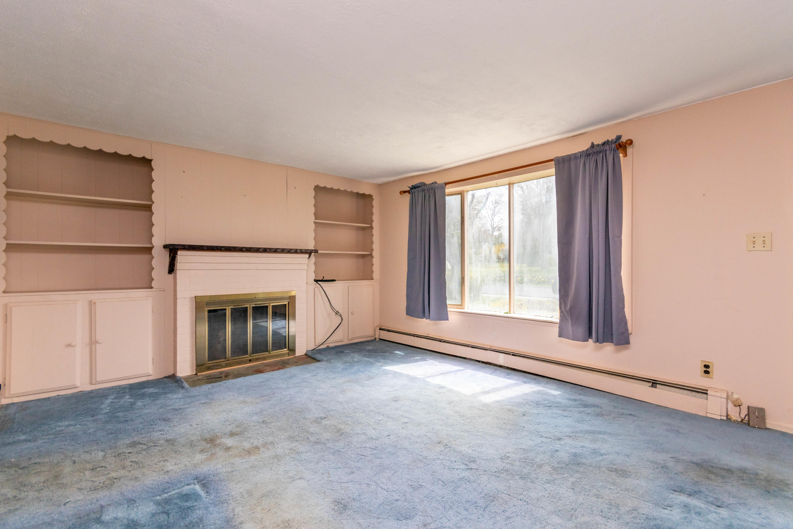 57 Puritan Road Buzzards Bay, MA 02532 - Photo 10 of 27 a view of empty room with a fireplace