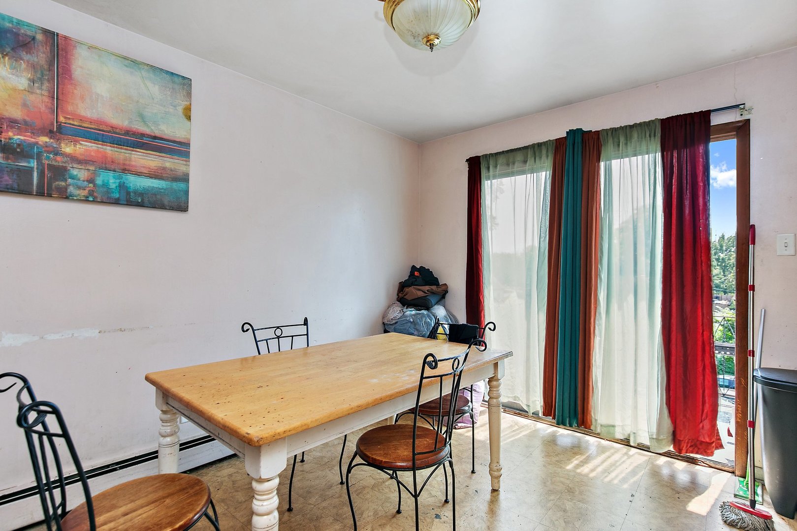 1955 Vermont Avenue Blue Island, IL 60406 - Photo 17 of 34 a view of a dining room with furniture and a window