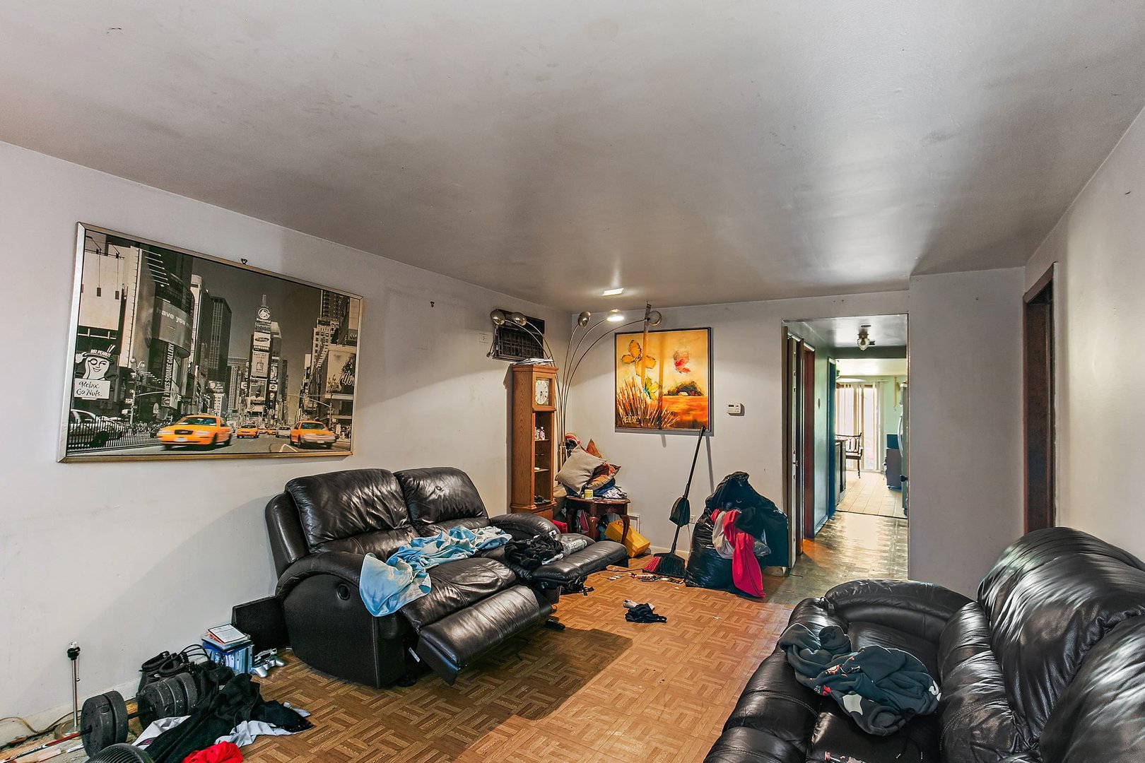 1955 Vermont Avenue Blue Island, IL 60406 - Photo 23 of 34 a living room with furniture a window and gym equipment