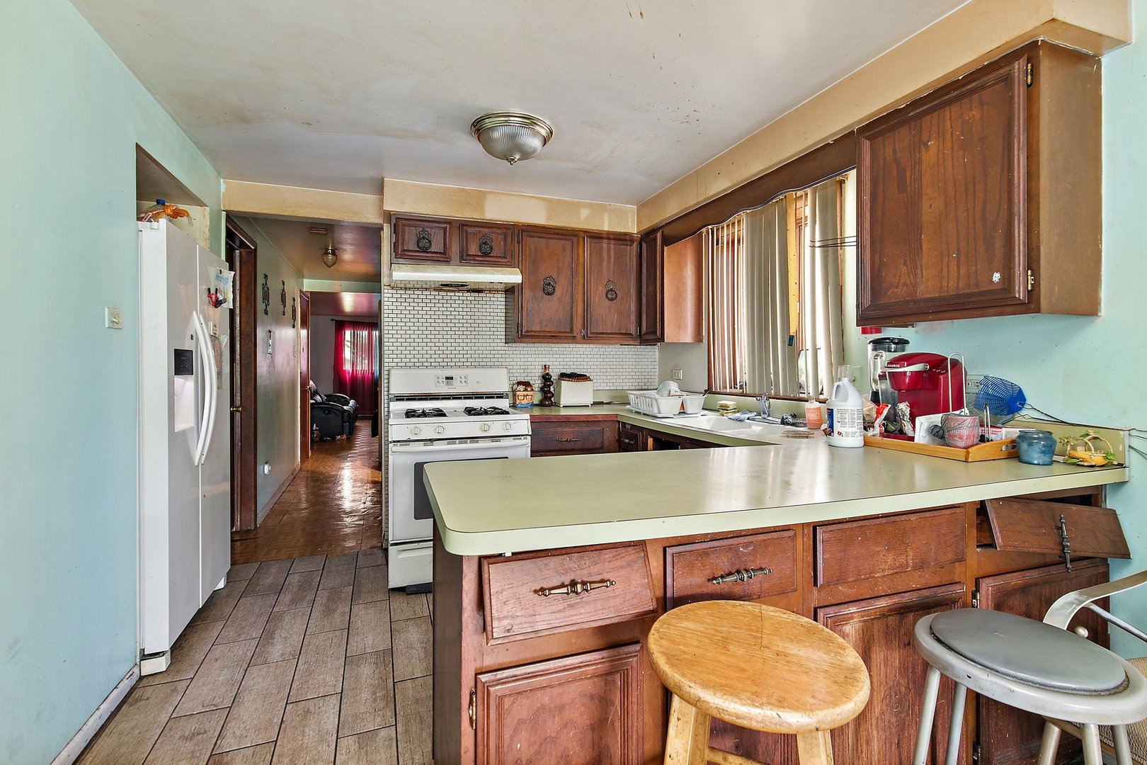 1955 Vermont Avenue Blue Island, IL 60406 - Photo 29 of 34 a kitchen with a sink appliances and cabinets