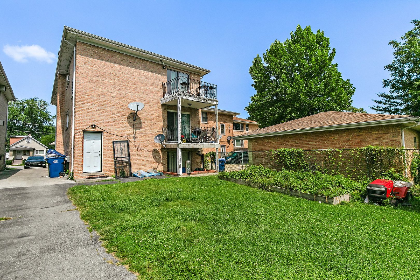 1955 Vermont Avenue Blue Island, IL 60406 - Photo 34 of 34 a view of a house with a garden