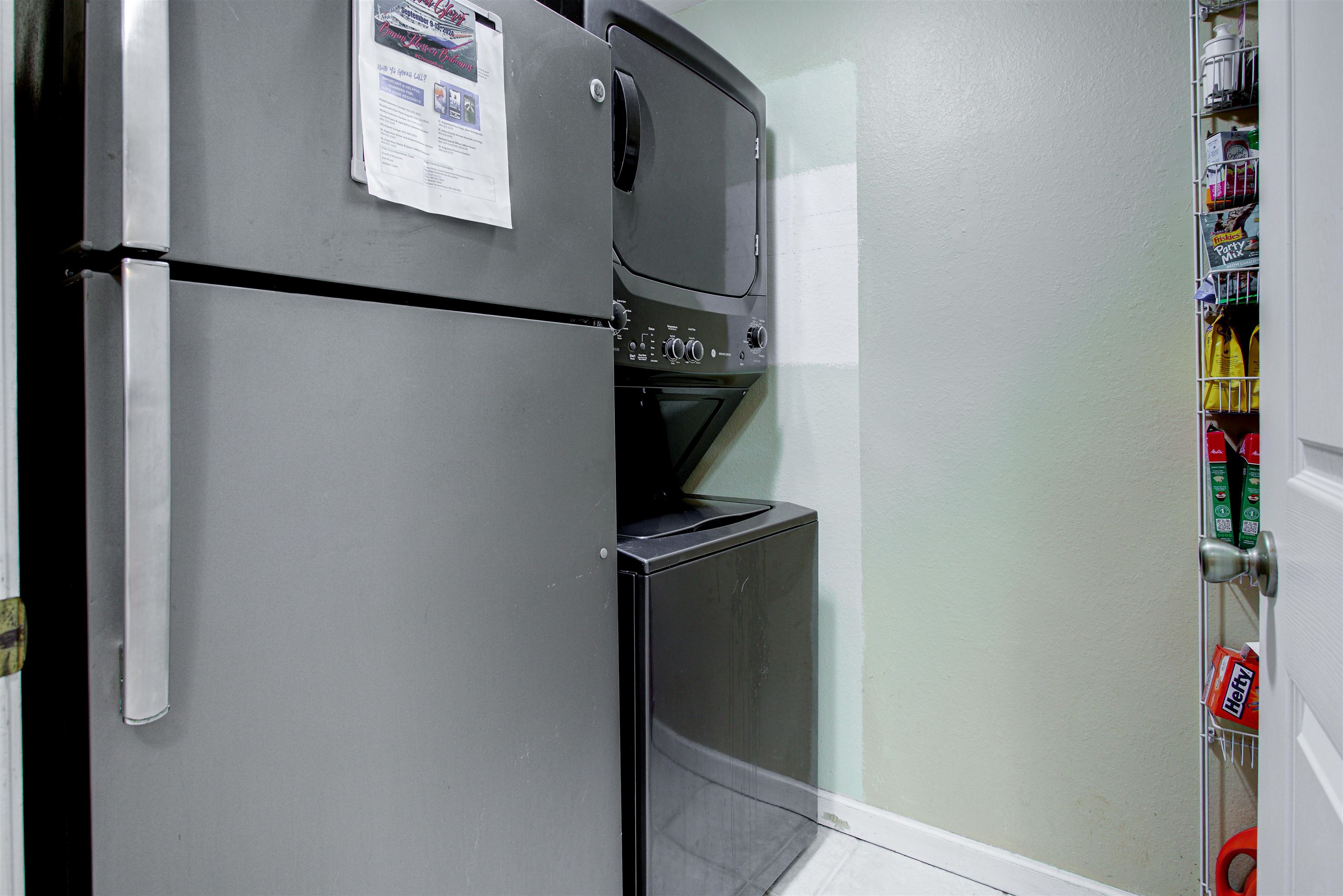 1800 Vista Cove Road St. Augustine, FL 32084 - Photo 22 of 69 Laundry area featuring stacked washer and clothes dryer